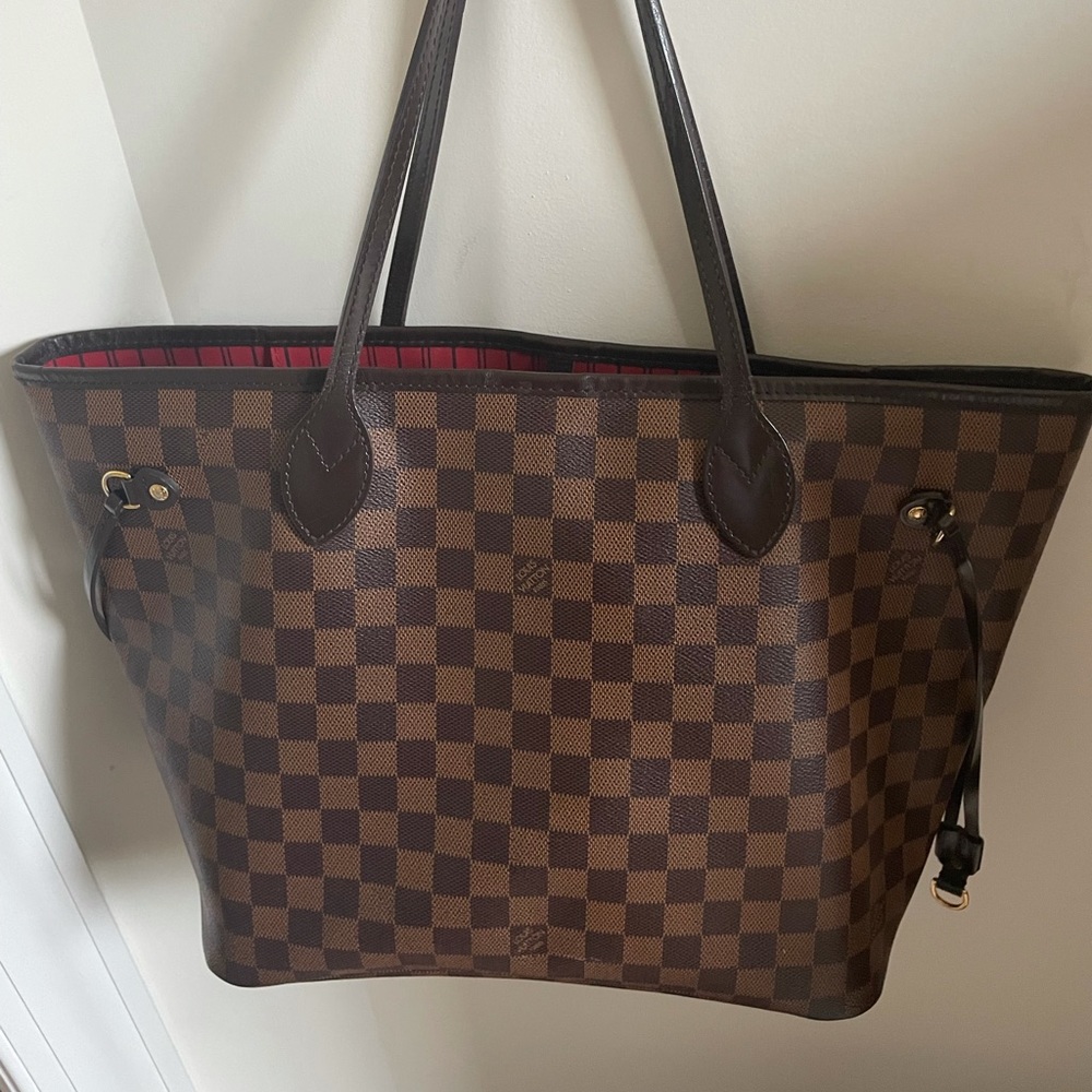 Medium authentic Louis never full with wristlet